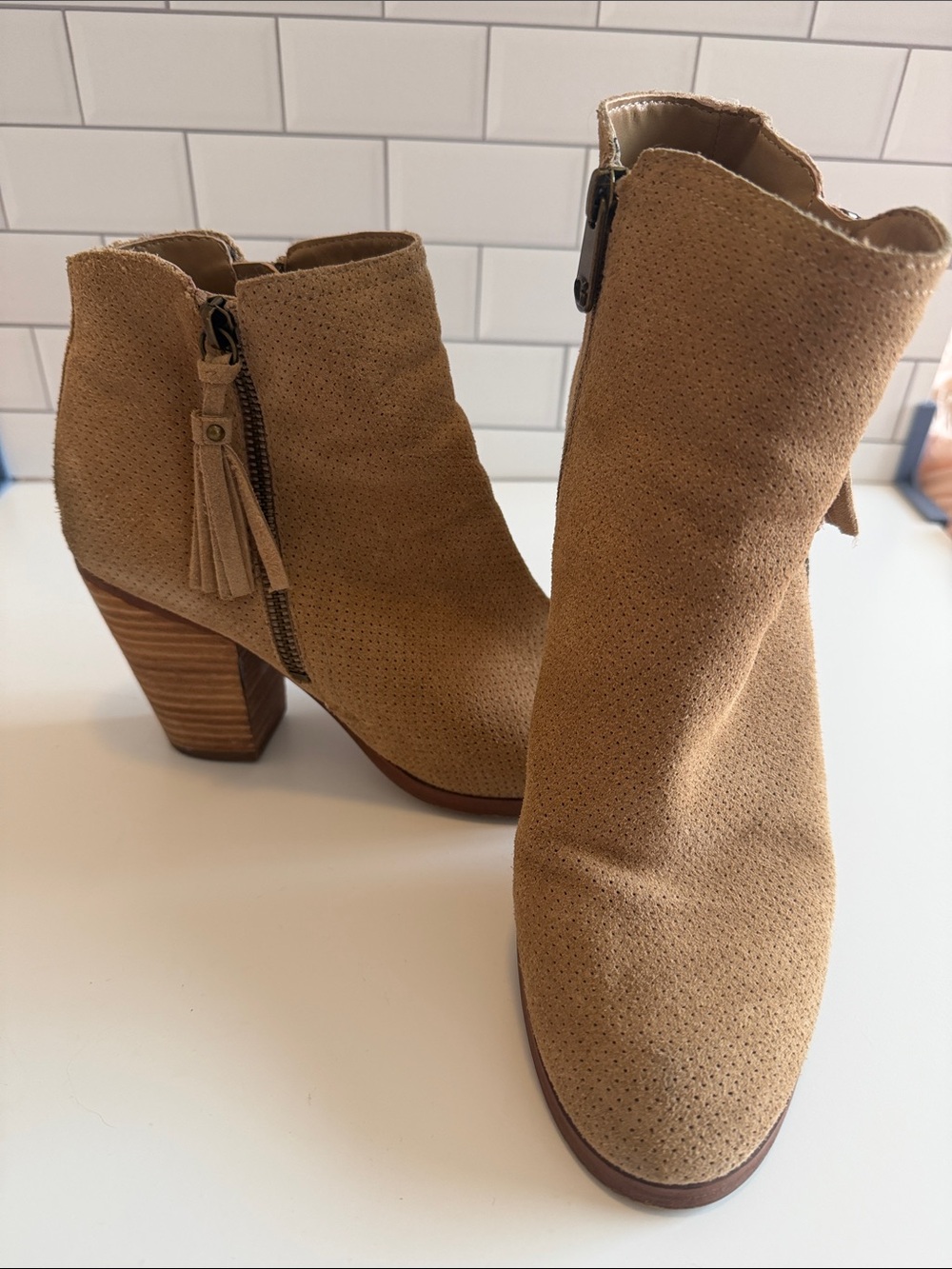 Guess Perforated Suede Tassel Ankle Boots in Tan